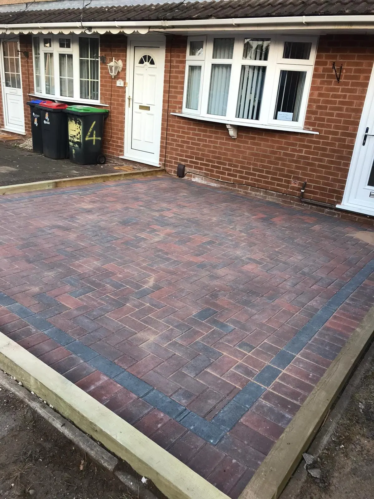 Brindle block paving driveway with a charcoal border at a bungalow