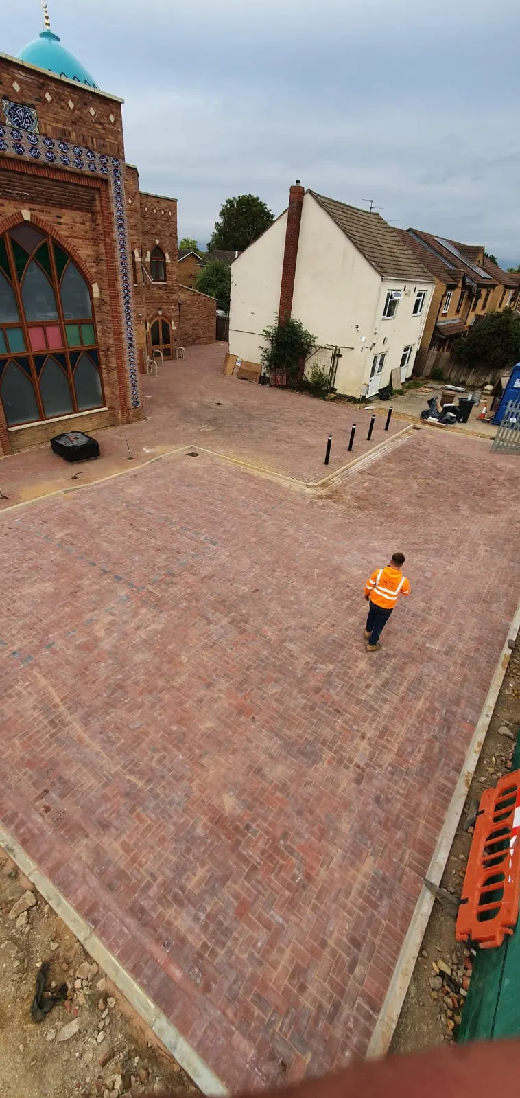 Large block paving area being laid in a courtyard