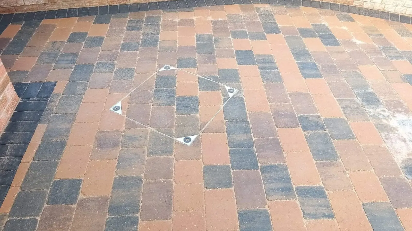 Multicolour block paving with a diamond feature marked out
