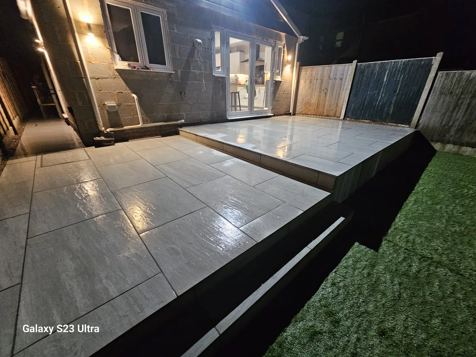 Raised porcelain patio in the evening